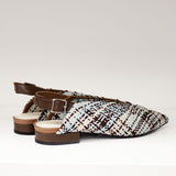 Tył balerin Tuffoni z regulowanym paskiem na pięcie wykonanym ze skóry naturalnej.