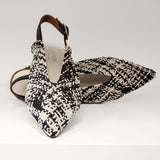 Czarno-białe baleriny Tuffoni z przodu – spiczasty nosek i fakturowana cholewka