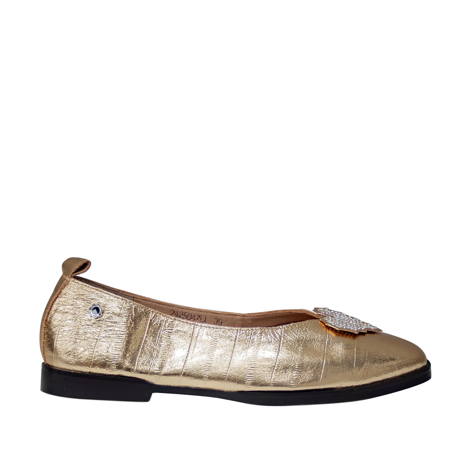 Złote baleriny Tuffoni ze skóry naturalnej z dekoracją w kształcie serca z cyrkonii, na płaskiej podeszwie, widok boczny.