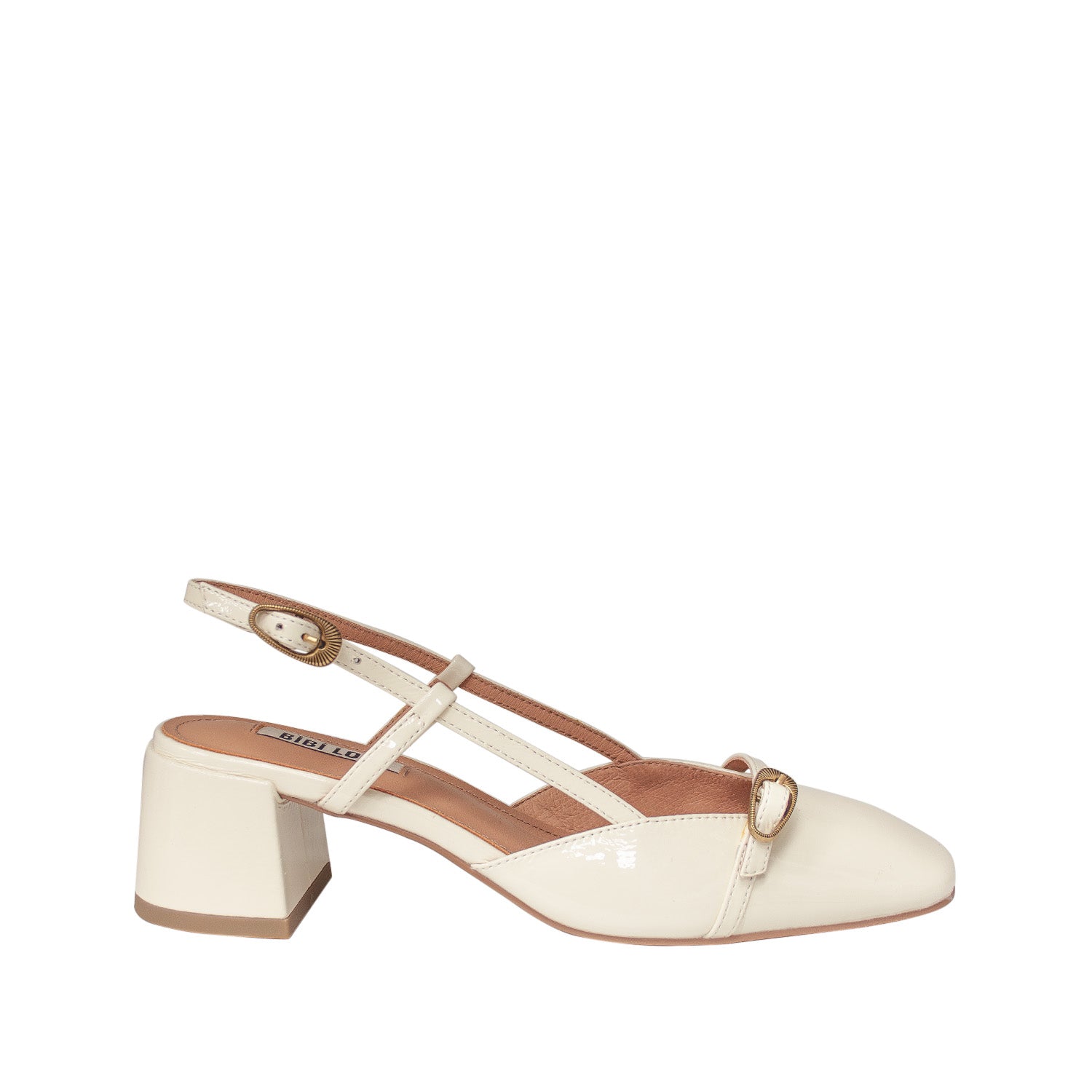 Hiszpańskie czółenka z odkrytą piętą Bibi Lou – kremowe, skórzane, lakierowane, widok z boku.