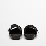 Mary Jane Marc O’Polo czarne, skóra naturalna – widok od tyłu, pokazujący elastyczną wstawkę przy pięcie.