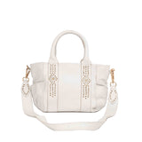 Shopperka Piti Cuiti – skórzana, hiszpańska torebka w jasnoszarym kolorze, widok z przodu z doczepionym długim paskiem.