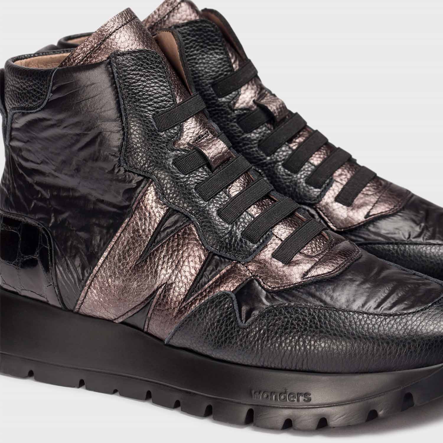 Wiosenne sneakersy Wonders – za kostkę, damskie, skóra naturalna, zbliżenie na fakturę skóry oraz wysokojakościowej tkaniny.