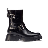 Czarne skórzane botki Wonders z masywną podeszwą i ozdobnymi klamrami, widok z boku.