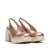 Czółenka Wonders NAIMA, widok pod kątem – metaliczne różowe złoto, zaokrąglony nosek, szeroki obcas i elastyczny pasek.